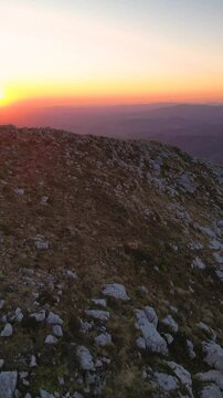 Rtanj mountain. Aerial view of the first rays of the rising sun above highest mountain peak Siljak.
