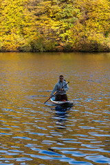 Supboarding in Autumn Foliage