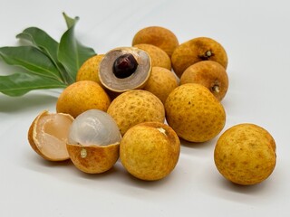 Longan  with leaf isolated on white background