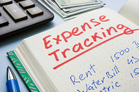 Close-up of a notebook with expense tracking as a symbol of financial management.