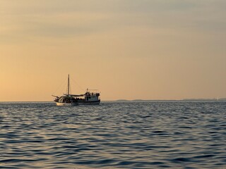 fishing boat at sunset