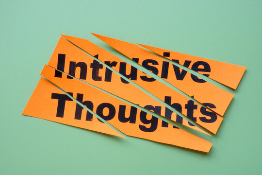 Cut paper with the label intrusive thoughts.