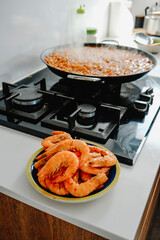spanish fideua, noodle paella, in the stove