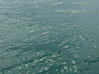 Blue sea water shiny aqua background