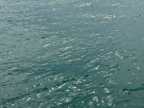 Blue sea water shiny aqua background