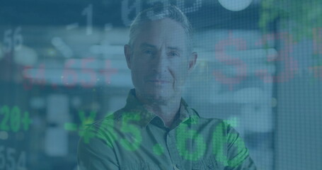 Image of financial data processing over caucasian businessman in office