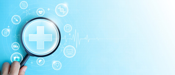 Hand holding magnifying glass focus plus and healthcare medical icon on blue background. health...