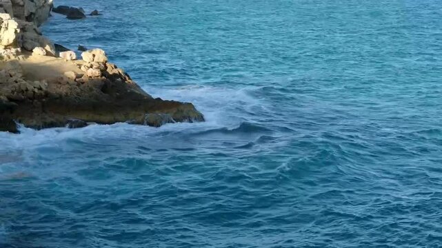sea ​​water crashing against rocks, Tarragona