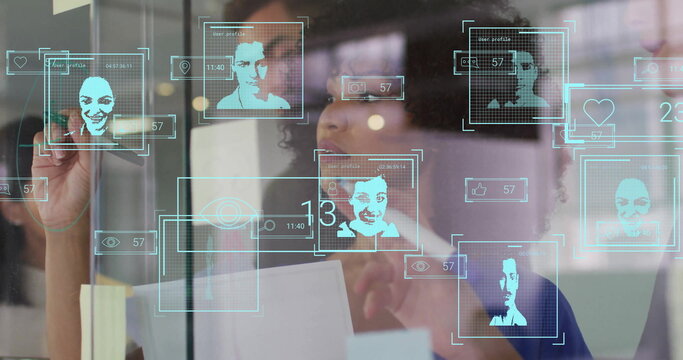 Image of biometric photos and data processing over diverse business people in office - Powered by Adobe
