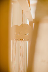 Wooden baby accessory by the crib © katya