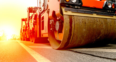 Roller lays new asphalt on the road