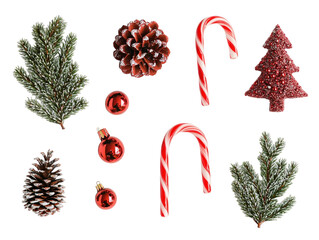 Flat lay of various red and green Christmas decorations including candy canes and pine cones on a white background.  PNG transparent.