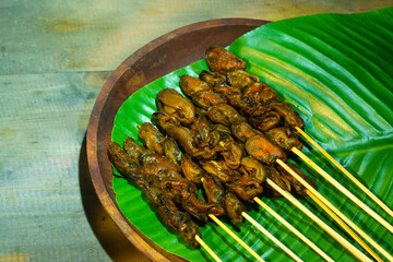 Satay Kerang Surabaya is a delicious Indonesian street food.