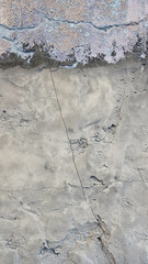 Peeling paint on an old wall. Grunge background for design.Selective focus