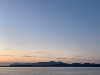 Sunset over the fjords and islands near Åmøy, Stavanger, Rogaland, Norway, August 2022
