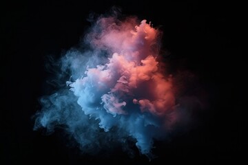 Naklejka premium Colorful smoke cloud displayed against a black background creating an artistic visual effect in a dark environment