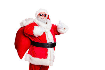 Portrait of his he cheerful cheery glad confident funky fat overweight plump gray-haired bearded man piggy backing bag showing thumbup isolated over bright vivid shine red background