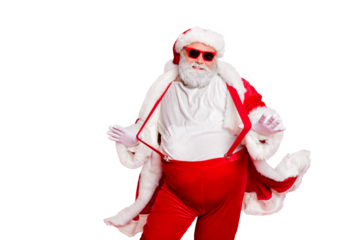 Portrait of style fat overweight santa claus with big funny belly abdomen touch his suspenders overalls posing like a model wearing trousers pants isolated over red background