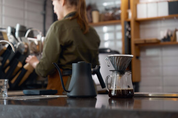 Front view on manual equipment for coffee preparation on table