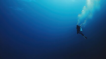 Diver in deep sea