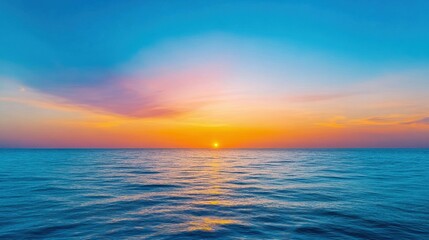 Fototapeta premium Peaceful Sunset Ocean Scene with Gentle Waves and Expansive Horizon