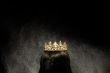 Gold Crown Diamond on hair wig model head. Sparking glitter diamond crown ready to put on winner...
