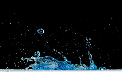 Crown Water splash on object to create shape form fluttering in droplet and wave. Crown water to...