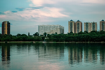 city skyline with lake
