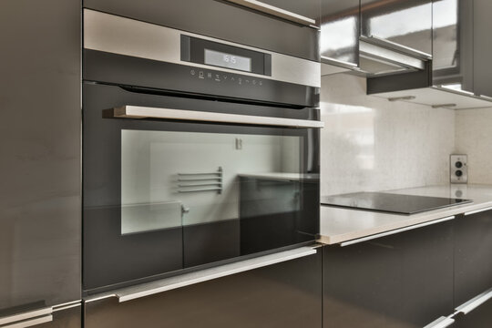 Modern kitchen with built-in appliances and sleek design