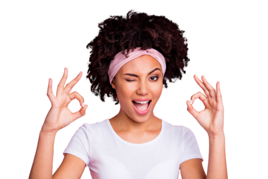 Close up photo beautiful amazing she her dark skin lady winking eye hold hand arm okey symbol toothy approve advising news wear head scarf casual white t-shirt isolated pink bright vibrant background