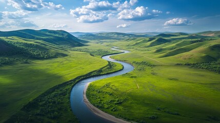 Aerial View of Winding River Through Lush Green Valley and Rolling Hills