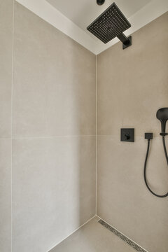 Contemporary shower design with black fixtures