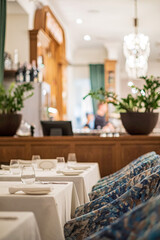 Interior of a .restaurant with tables and chairs