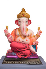 Ganesha Idol. Hindu God Ganesha on white background, Ganesh festival. Pune, Maharashtra, India.