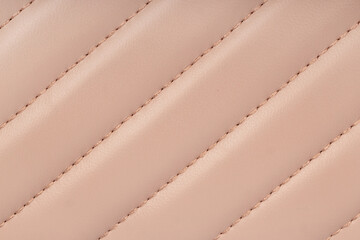 Close-Up of Beige Quilted Leather Texture