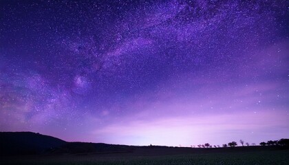 Fototapeta premium Elevate your campaign with an artistic representation of a low-angle view of the enchanting purple night Let stars and moonlight create a serene glow that lures viewers in