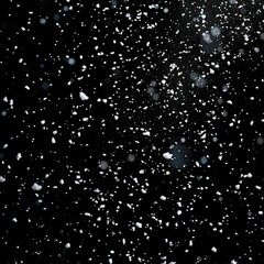 Snow falling on a black background