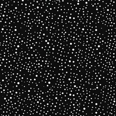 Abstract white dots on black