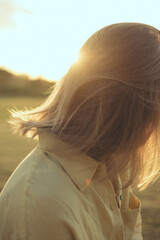 woman looking at the sunset