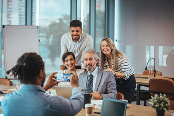 Diverse Team Posing for a Group Photo in Office Setting