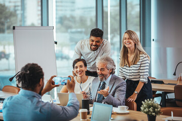 Team Celebrating A Successful Business Meeting In Office