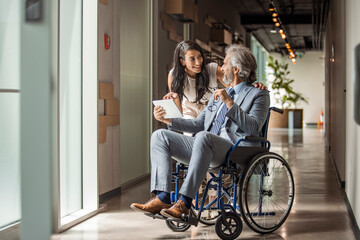 Professional Collaboration in Office with Wheelchair User