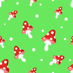 Pattern with fly agaric on a green background