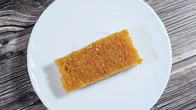 Bassima or Basmia sweet like basbousa, an Eastern candy made as a celebration of the prophet's Mohamed birthday in Egypt, Arabian and Islamic country, traditional Arabian candy of El Mawled El Nabawi