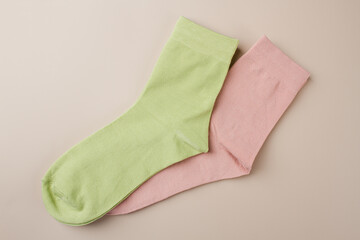 Colored socks on a beige background