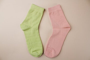Colored socks on a beige background