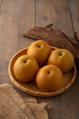 Japanese pears,Asian pears.
Asian pears: any of a variety of pears, mainly of Japanese and Chinese origin, with crisp, juicy flesh and typically have yellow, brown, or green skin.
