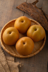 Japanese pears,Asian pears.
Asian pears: any of a variety of pears, mainly of Japanese and Chinese origin, with crisp, juicy flesh and typically have yellow, brown, or green skin.
