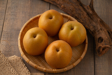Japanese pears,Asian pears.
Asian pears: any of a variety of pears, mainly of Japanese and Chinese origin, with crisp, juicy flesh and typically have yellow, brown, or green skin.
