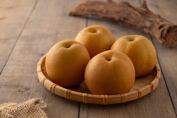Japanese pears,Asian pears.
Asian pears: any of a variety of pears, mainly of Japanese and Chinese origin, with crisp, juicy flesh and typically have yellow, brown, or green skin.
